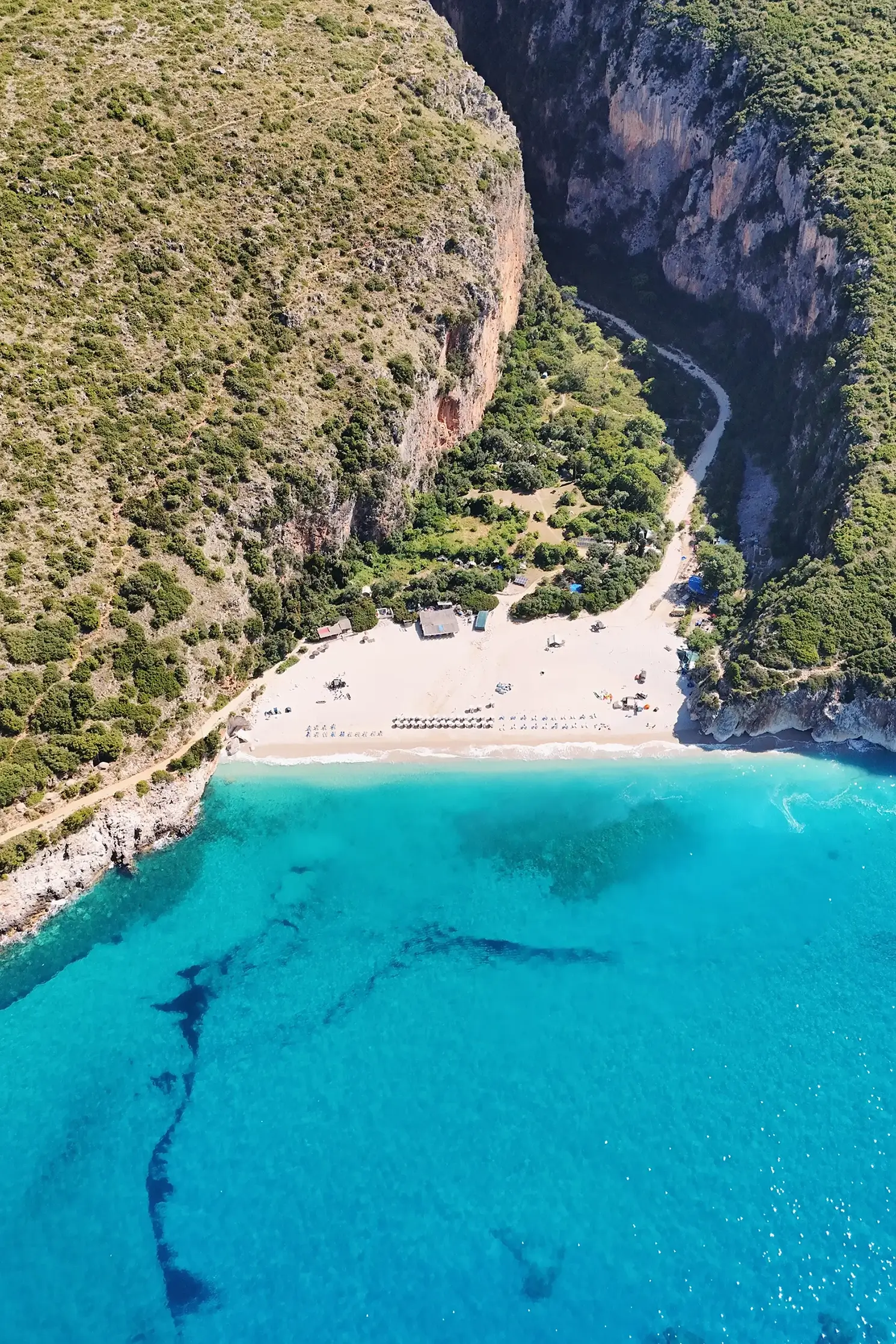 You’ll have to walk the last couple of kilometers, but I promise that you'll find what might be Albania’s most beautiful beach.
